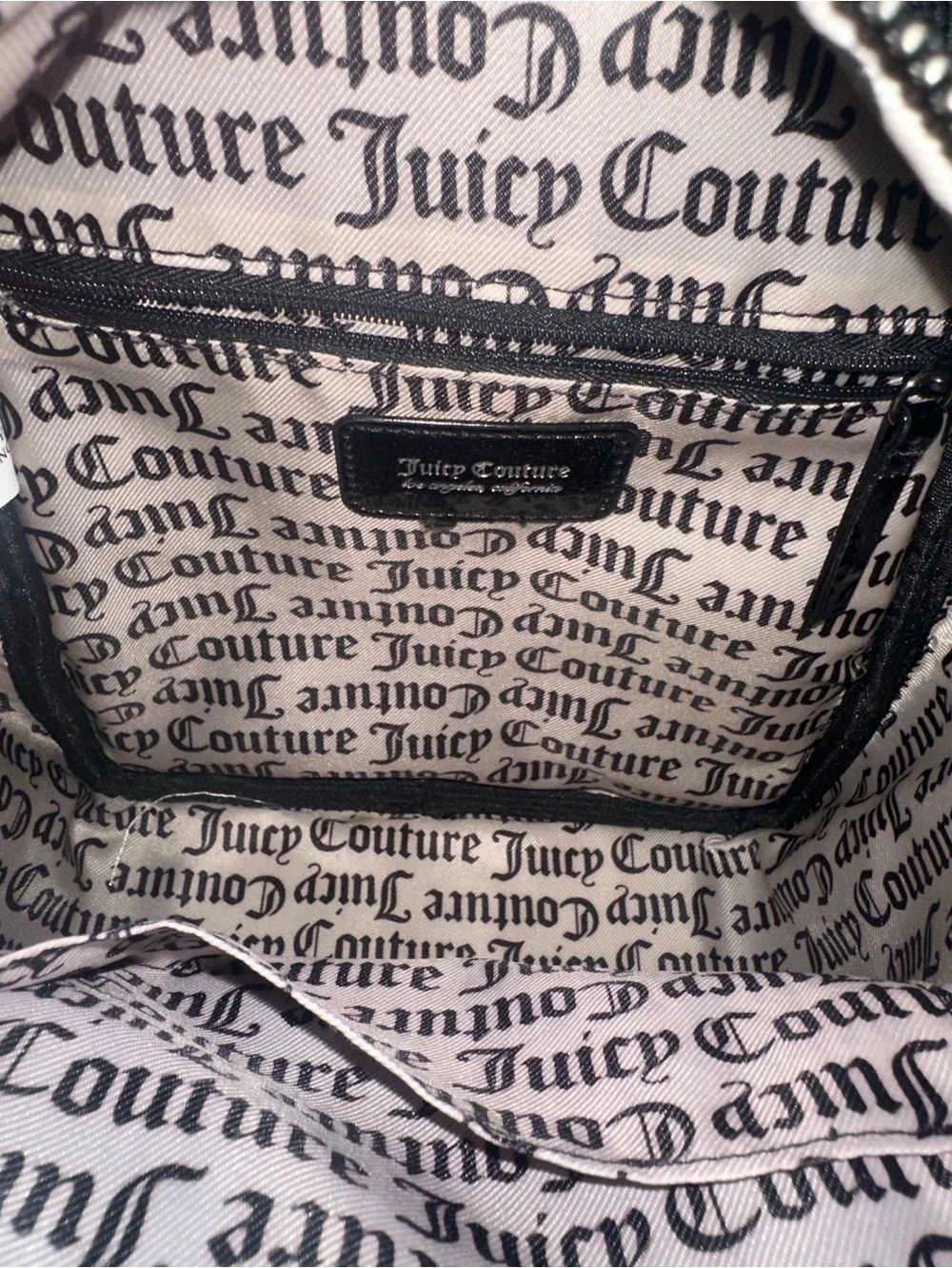 Juicy Couture Black Patent Mini Backpack, new without tags. Excellent condition.
